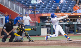 Keegan Knutson, 19, gets hit in the head by the ball during a game at the Condron Ballpark in Gainesville, Fla., on Thursday, April 10, 2025. (Hanna Maglio/WRUF)